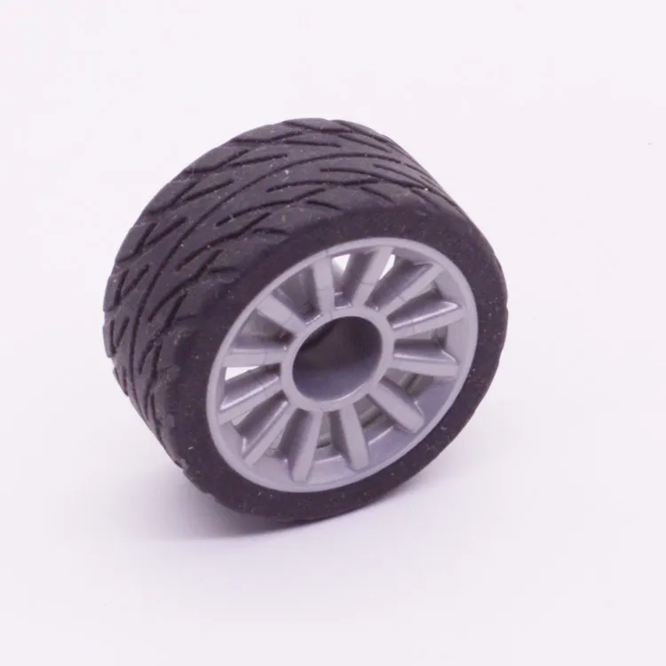 Spare part Playmobil 30250353 Rim with tire D39x18mm - Grey